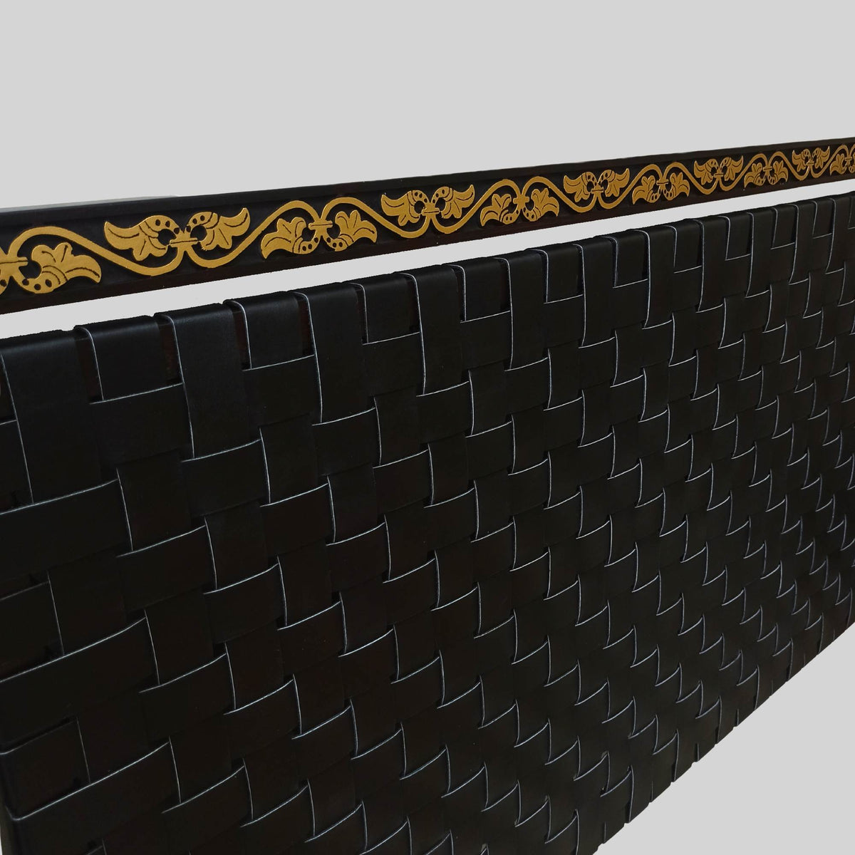 Profile view highlighting artisan joints and leather loopwork