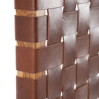 Close-up shot of the leather king headboard.