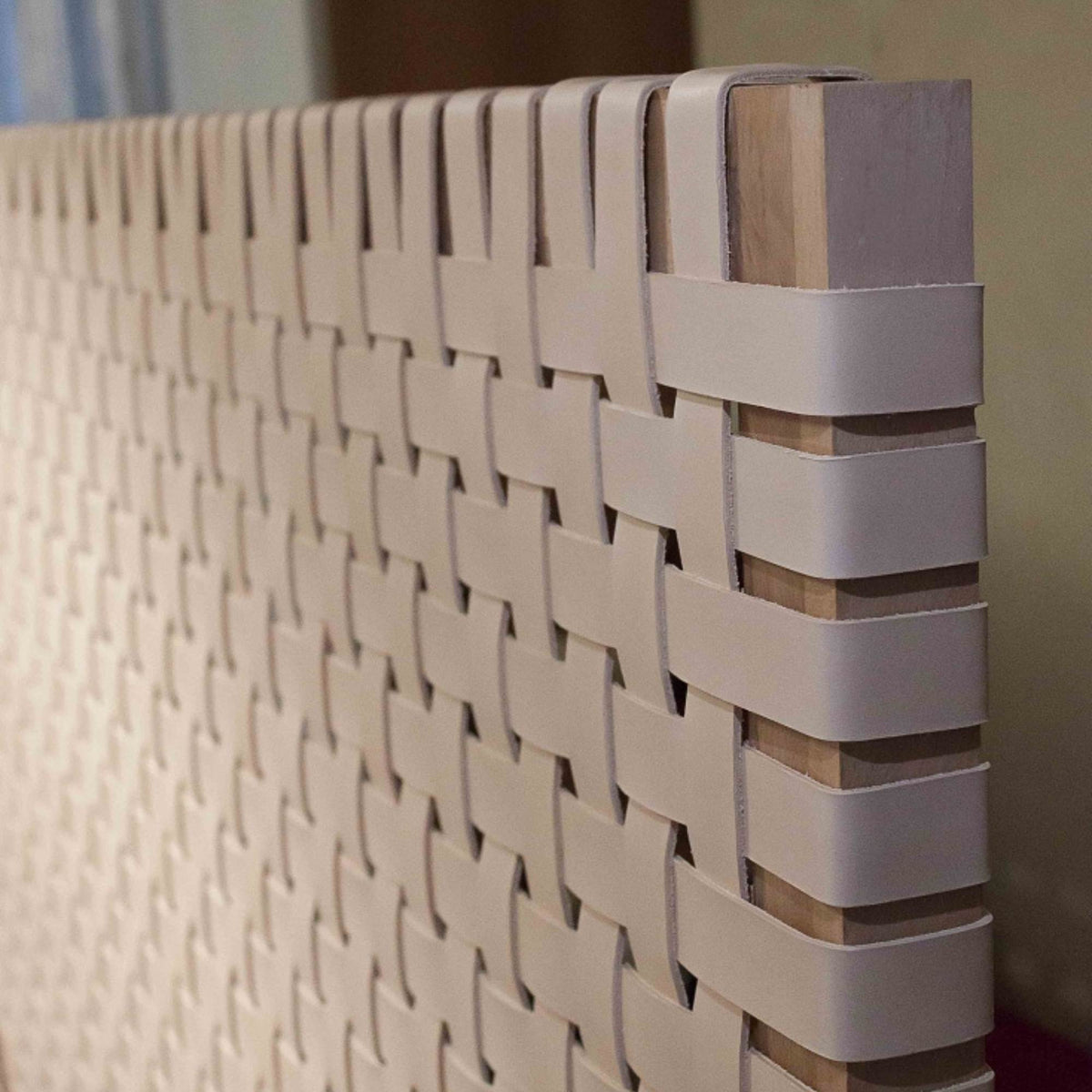 Handcrafted leather headboard, a timeless addition to any bedroom.